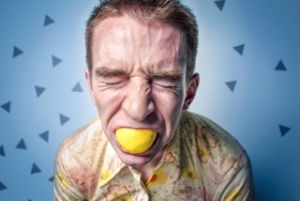 anxiety therapy stressed man bites lemon